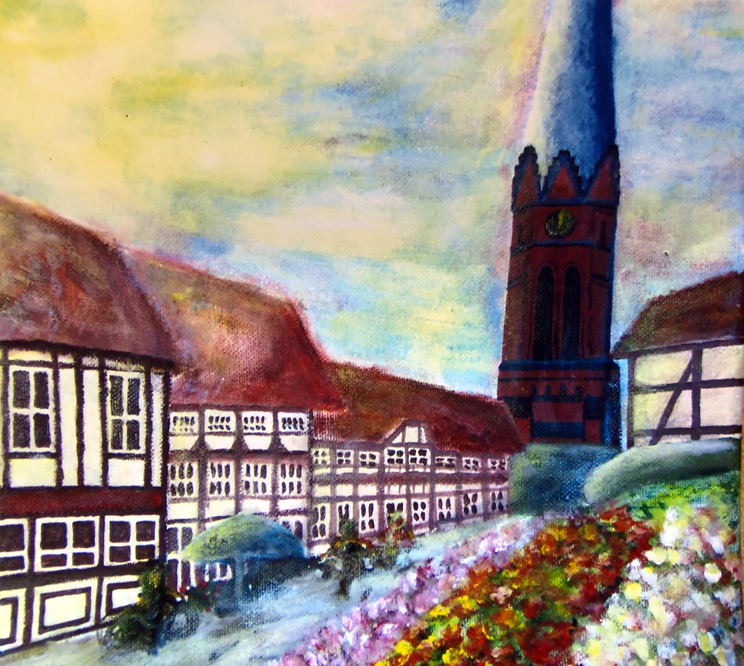 Farbenreiche Stadtansicht mit Fachwerkhäusern und Kirchturm